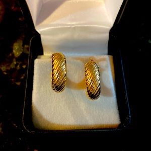 These are small hoops eating 14k gold. Never worn